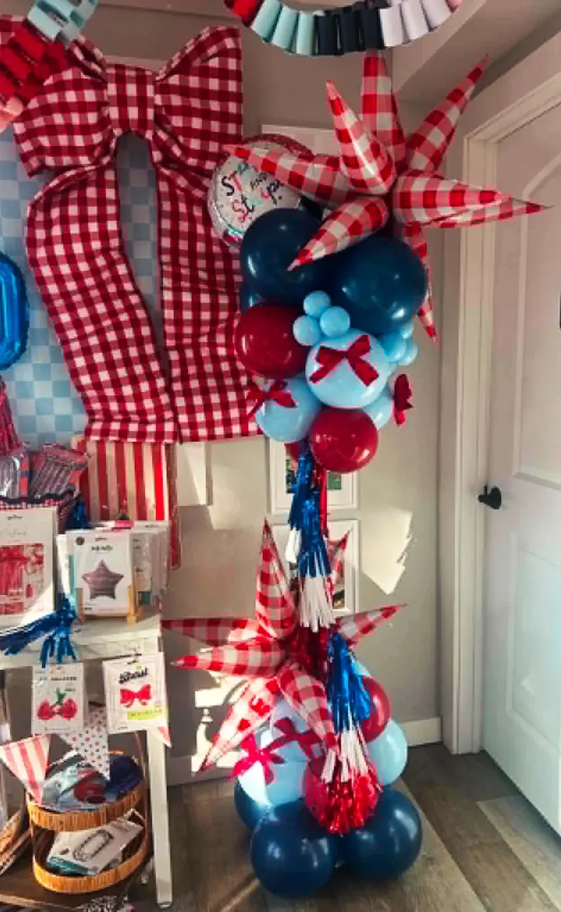 Ole Miss balloon column — navy, red, light blue with red/white striped star foils