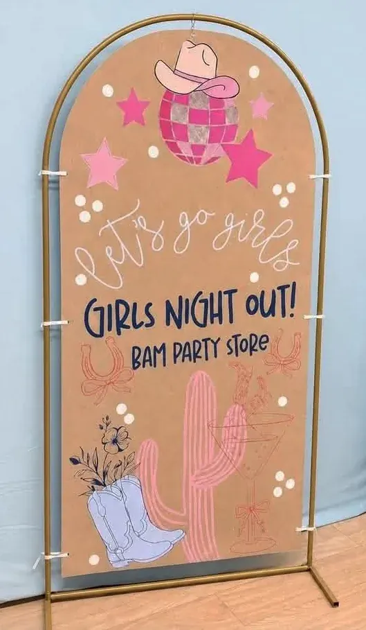 Hand-painted arch banner: Let’s go girls, Girls Night Out, BAM Party Store with disco ball, cactus, and boots
