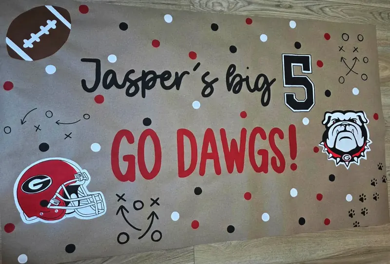 Hand-painted kraft banner: Jasper’s big 5, Go Dawgs with Georgia helmet and bulldog