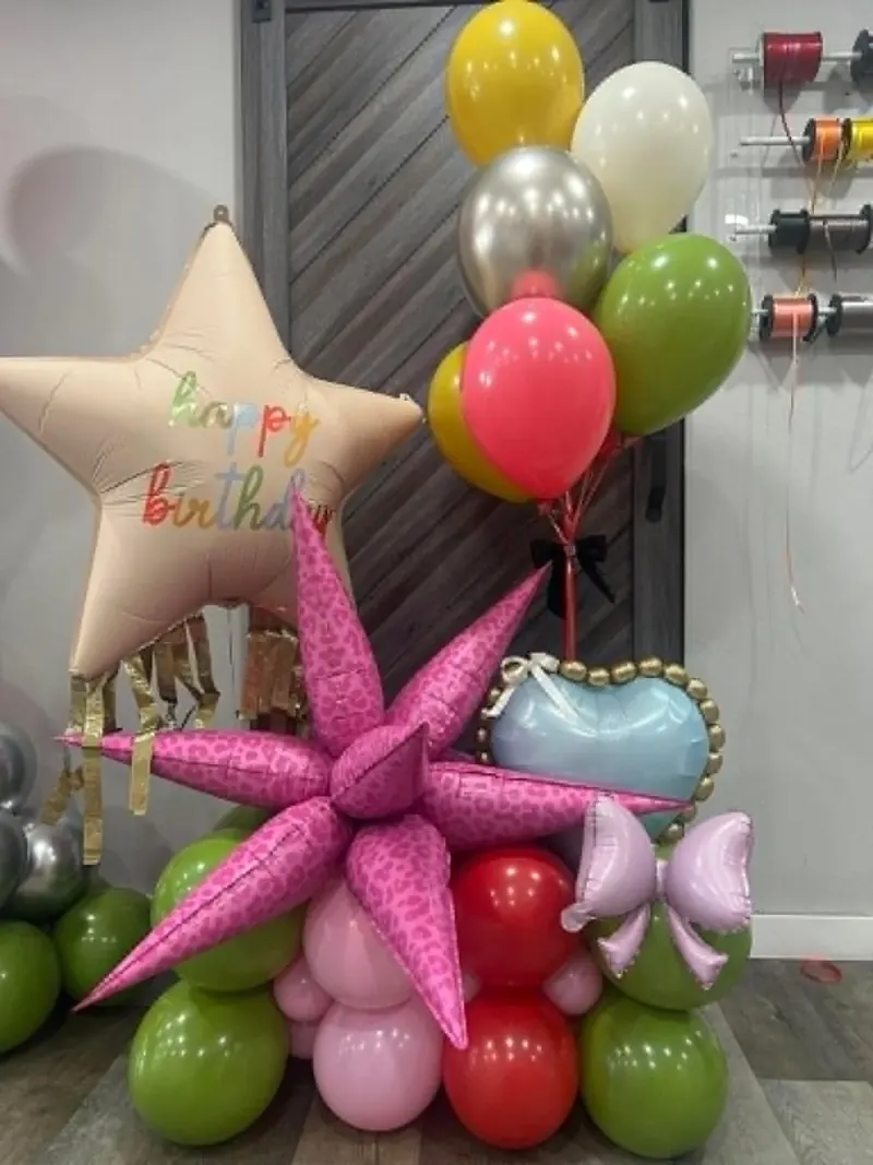 Hot pink leopard print star balloon stack with cream Happy Birthday star foil, pink heart, and lime green and red balloon base